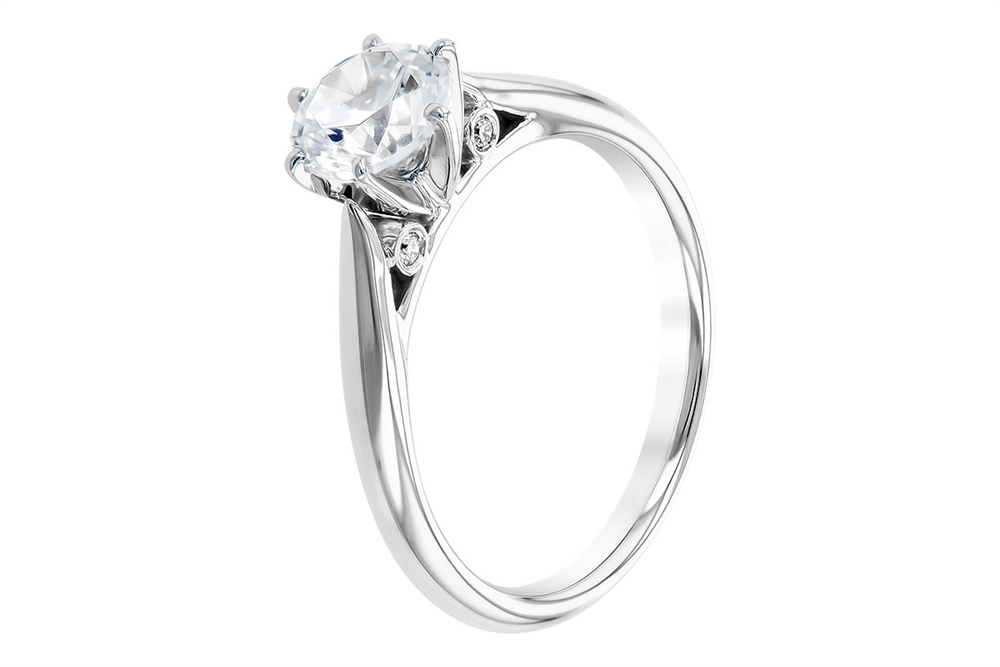 An Allison Kaufman 14k white gold semi mount ring features a plain band in a cathedral style, with a round center setting and two small accent stones, showcased against a white background.