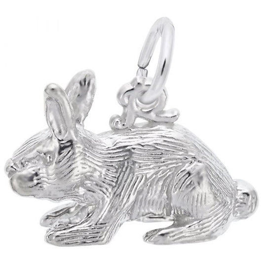 The Rabbit Charm in sterling silver by Rembrandt Charms features a detailed fur texture and perked-up ears, complete with a loop on top for easy attachment to bracelets or necklaces. The charm is displayed against a plain white background.