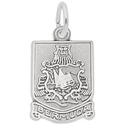 The Bermuda Crest / Sterling Silver Charm by Rembrandt Charms is a rectangular travel keepsake pendant that showcases the coat of arms of Bermuda. The emblem highlights a lion holding a shield with a sinking ship, and "BERMUDA" is inscribed at the bottom. The charm features a small circular loop at the top for attachment.