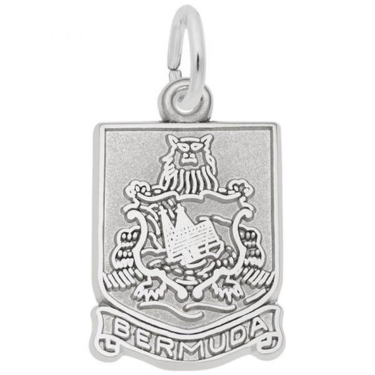 The Bermuda Crest / Sterling Silver Charm by Rembrandt Charms is a rectangular travel keepsake pendant that showcases the coat of arms of Bermuda. The emblem highlights a lion holding a shield with a sinking ship, and "BERMUDA" is inscribed at the bottom. The charm features a small circular loop at the top for attachment.