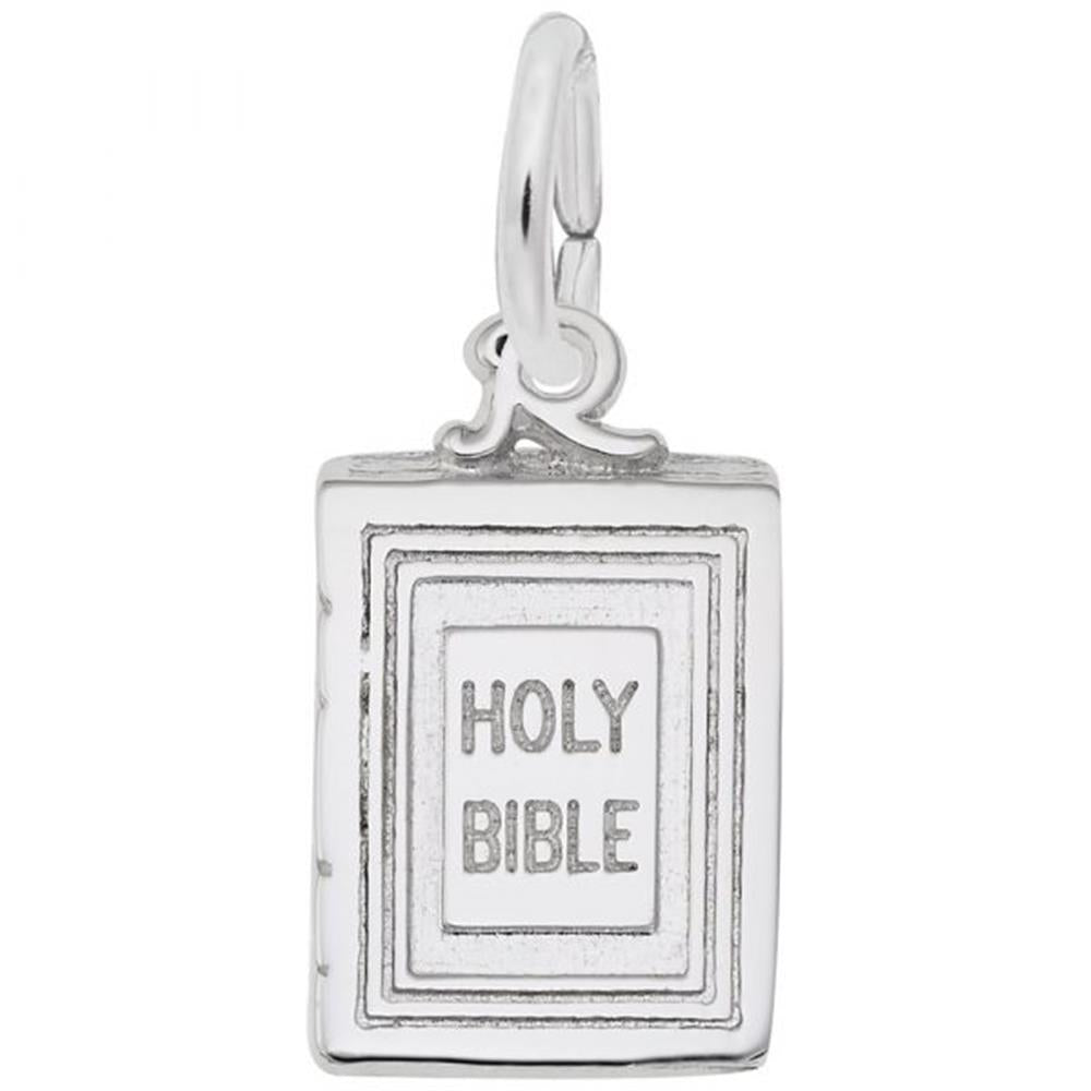 A stunning Bible Charm crafted from sterling silver by Rembrandt Charms, featuring a book design with "HOLY BIBLE" engraved on the front cover. This pendant boasts a small attached loop at the top, making it perfect for use as either a charm or necklace. Its simple, elegant design with a polished finish beautifully captures Bible symbolism.
