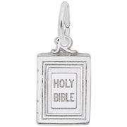 A stunning Bible Charm crafted from sterling silver by Rembrandt Charms, featuring a book design with "HOLY BIBLE" engraved on the front cover. This pendant boasts a small attached loop at the top, making it perfect for use as either a charm or necklace. Its simple, elegant design with a polished finish beautifully captures Bible symbolism.