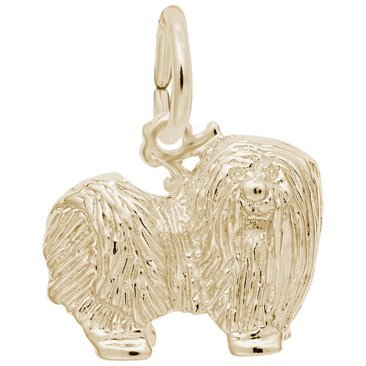 The Rembrandt Charms Maltese Charm in gold-plated sterling silver is meticulously crafted to resemble a Maltese dog, featuring intricate fur detailing and a small, round nose. A small loop at the top allows it to be easily attached to a bracelet or necklace.