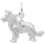 The Border Collie 3D Dog Charm in Sterling Silver by Rembrandt Charms captures the essence of a Border Collie with its detailed fur texture, perky ears, raised tail, and a small hoop at the top for easy attachment to jewelry. This sterling silver charm showcases the dog in a standing position.