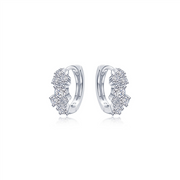 The Lafonn Huggie Earrings with Shiny Clusters are a pair of elegant white gold earrings adorned with clusters of small, shimmering diamonds. The shiny clusters enhance the secure latch-back closure and offer a delicate, sparkling design perfect for a sophisticated accessory.