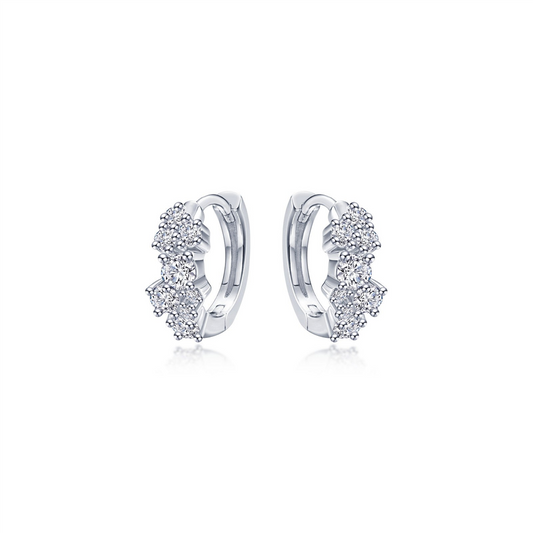 The Lafonn Huggie Earrings with Shiny Clusters are a pair of elegant white gold earrings adorned with clusters of small, shimmering diamonds. The shiny clusters enhance the secure latch-back closure and offer a delicate, sparkling design perfect for a sophisticated accessory.