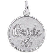 The Bride Engravable Disc Charm in sterling silver by Rembrandt Charms features a round pendant with a textured background. The word "Bride" is elegantly engraved in cursive at the center, accompanied by an image of two interlocked wedding rings below it. This charming piece includes a small loop at the top for easy attachment to a chain or bracelet.