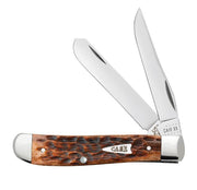 A pocket knife named the Brown Bone Peach Seed Jig Mini Trapper by W.R. Case & Sons Cutlery Co. features a textured, brown bone handle with the word "CASE" engraved on a metal plate. The Mini Trapper includes two shiny, stainless steel blades of different sizes, and its handle is adorned with polished metal caps at both ends.