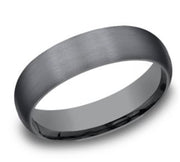 The 6mm Tantalum Domed Satin Ring by Benchmark Rings features a simple, polished gray surface with a subtle satin finish and smoothly rounded edges. This comfort-fit ring offers a plain yet modern, minimalist design and is showcased against a plain white background.