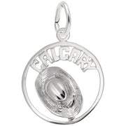 The Calgary Cowboy Hat Sterling Silver Charm by Rembrandt Charms features a detailed cowboy hat in the center, with the word "CALGARY" elegantly engraved around the top edge. A small loop at the top makes it easy to attach this charm to a chain or bracelet.