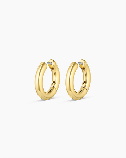 A pair of Gorjana Lou Hoops with a chunky, polished design and 18k gold plated shine, shown on a plain white background.