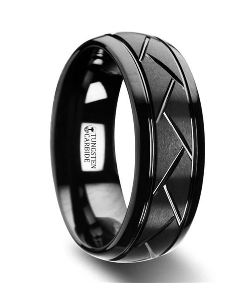 The ENIGMA Domed Black Tungsten Ring by Thorsten features a brushed cross alternating diagonal cuts pattern around its circumference. The 8mm wide ring, available in size 10, has a polished interior engraved with the words "TUNGSTEN CARBIDE.