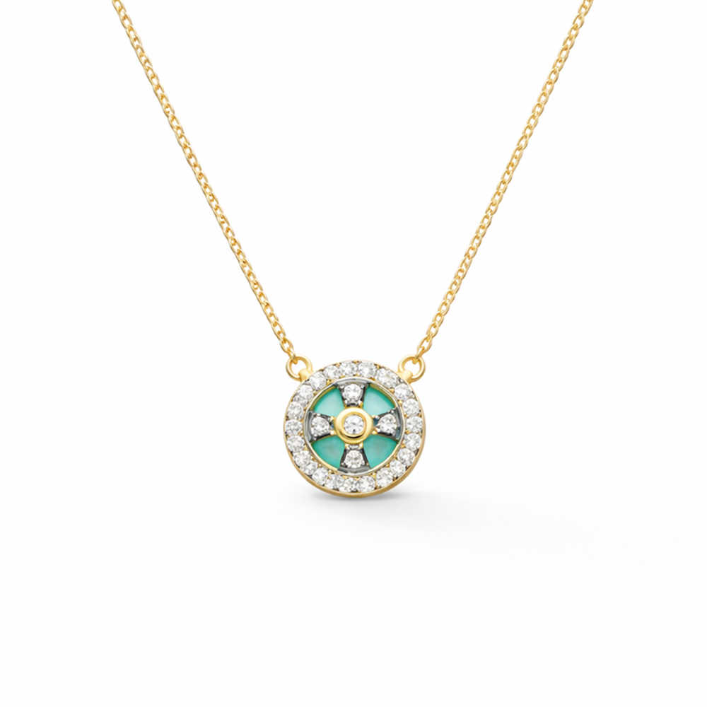 The Freida Rothman YRZ070196B-16E Clover Cage Turquoise Necklace is a gold chain with a circular pendant featuring a green and white geometric clover design, turquoise center stone, and clear stone border.