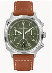 The Bulova Watch Company 96B482 Military VW1 Special Edition features a sage green face, silver case, chronograph with three subdials, date window at 6 o’clock, and a brown leather band with white stitching for a classic look.