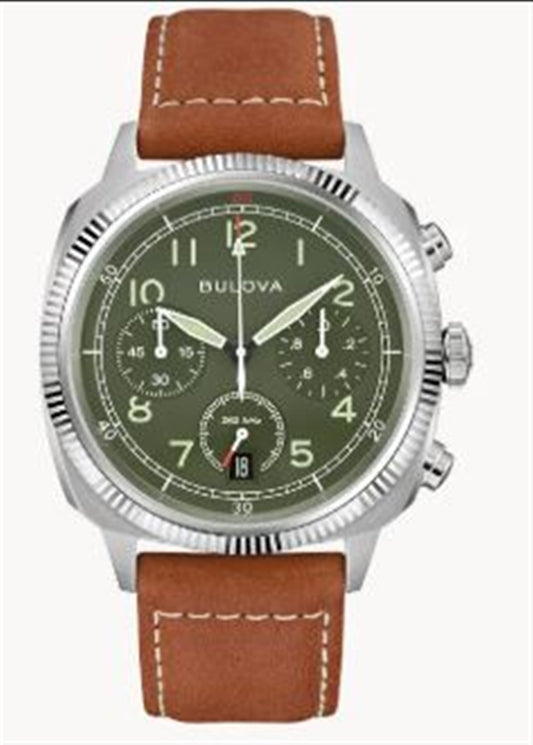 The Bulova Watch Company 96B482 Military VW1 Special Edition features a sage green face, silver case, chronograph with three subdials, date window at 6 o’clock, and a brown leather band with white stitching for a classic look.
