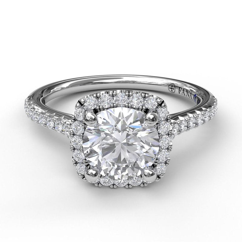 The FANA 14K White Gold Cushion Halo Diamond Engagement Ring features a cushion-cut center, a halo of smaller diamonds, and a thin pavé diamond band for timeless elegance.