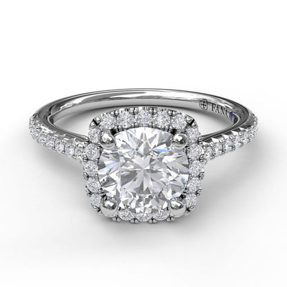 The FANA 14K White Gold Cushion Halo Diamond Engagement Ring features a cushion-cut center, a halo of smaller diamonds, and a thin pavé diamond band for timeless elegance.