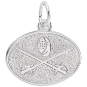 The Rembrandt Charms Fencing Oval Disc Charm in sterling silver features a detailed design of a fencing mask above two crossed fencing swords, set against a textured background. The charm includes a small loop at the top for easy attachment to a necklace or bracelet.