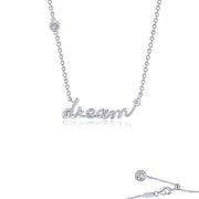 The Dream Word Necklace by Lafonn is a sterling silver piece, bonded with platinum, showcasing the word "dream" in elegant cursive script. Adorned with diamond-like stones at the beginning, middle, and end of the word, the necklace also features a chain with a clasp and a dangling charm for an added touch of sophistication and delicacy.