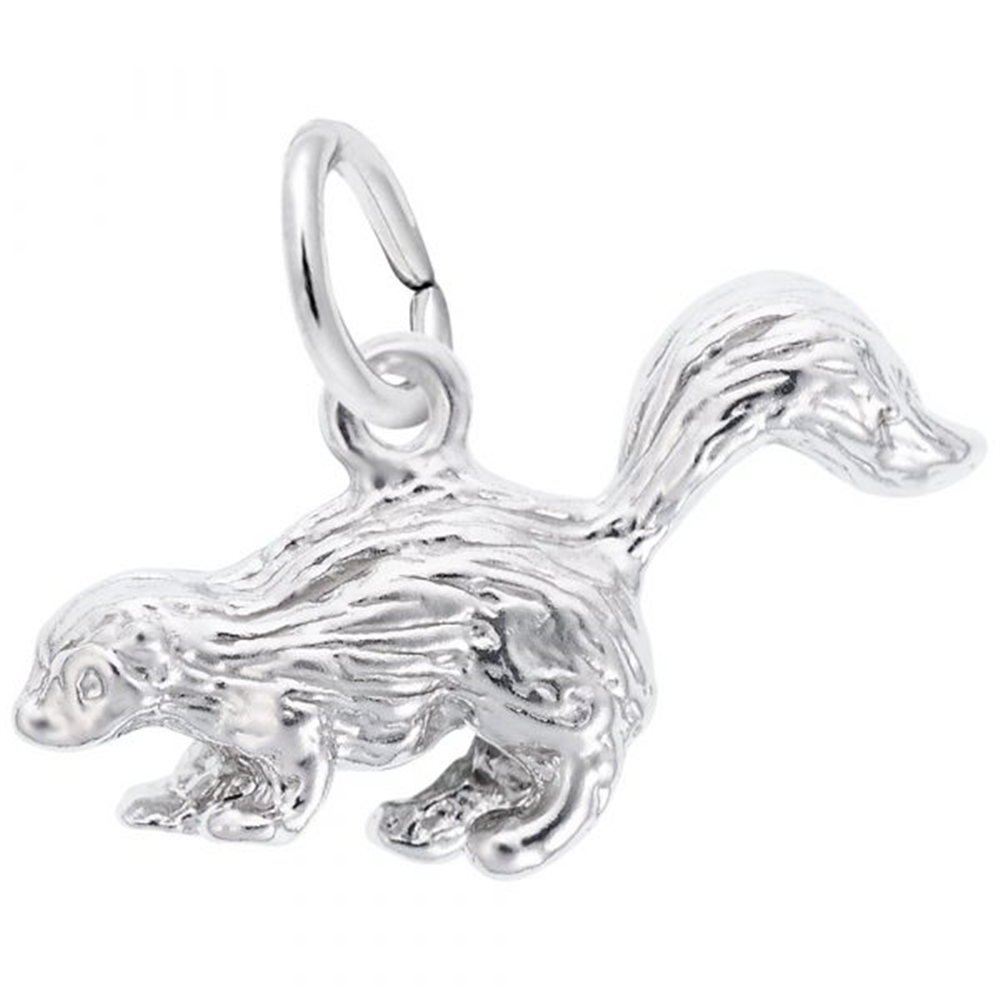 The Skunk Charm in Sterling Silver by Rembrandt Charms features a shiny finish and a raised, bushy tail. This piece showcases detailed fur textures and includes a small loop for easy attachment to a chain or bracelet.