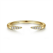 Presenting the 14K Yellow Gold Open Diamond Tipped Stackable Ring by Gabriel & Co. This elegant piece features two pointed ends adorned with shimmering diamonds, delicately curved for a refined look. Inscribed with "Gabriel & Co." on the inner band, this design from the Gabriel Stackables collection embodies simplicity and luxury.