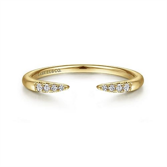Presenting the 14K Yellow Gold Open Diamond Tipped Stackable Ring by Gabriel & Co. This elegant piece features two pointed ends adorned with shimmering diamonds, delicately curved for a refined look. Inscribed with "Gabriel & Co." on the inner band, this design from the Gabriel Stackables collection embodies simplicity and luxury.
