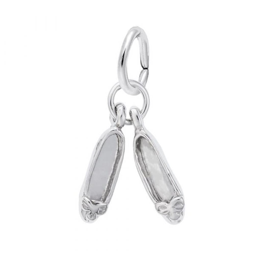The image shows the Sterling Silver Pair of Ballet Shoes Accent Charm from Rembrandt Charms. The charm is crafted in sterling silver and features a detailed design of a pair of ballet shoes. It measures 0.17 inches by 0.5 inches (4.38 mm x 12.61 mm) and has the style number 0448. This charm is a perfect keepsake for dancers and ballet enthusiasts.