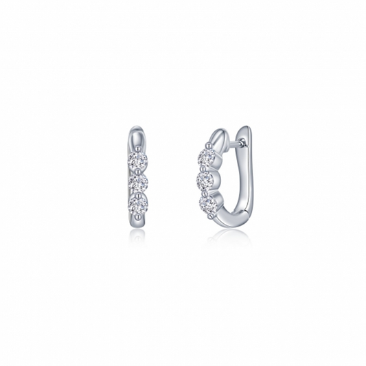 A pair of Lafonn W 3 stone huggies is displayed. These silver hoop earrings feature three round diamonds set in a vertical row along the front outer edge. The earrings have a polished, shiny finish and a hinged closure. The image shows both a front and side view of the earrings.