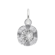 The Rembrandt Charms Petite Birthstone - April Charm in sterling silver features a round, sparkling diamond at its center. Designed with a loop at the top for attaching to a chain, the pendant showcases a partial cross pattern surrounding the diamond with small, glimmering stones. This piece is perfect as an April birthstone gift or as a petite keepsake.