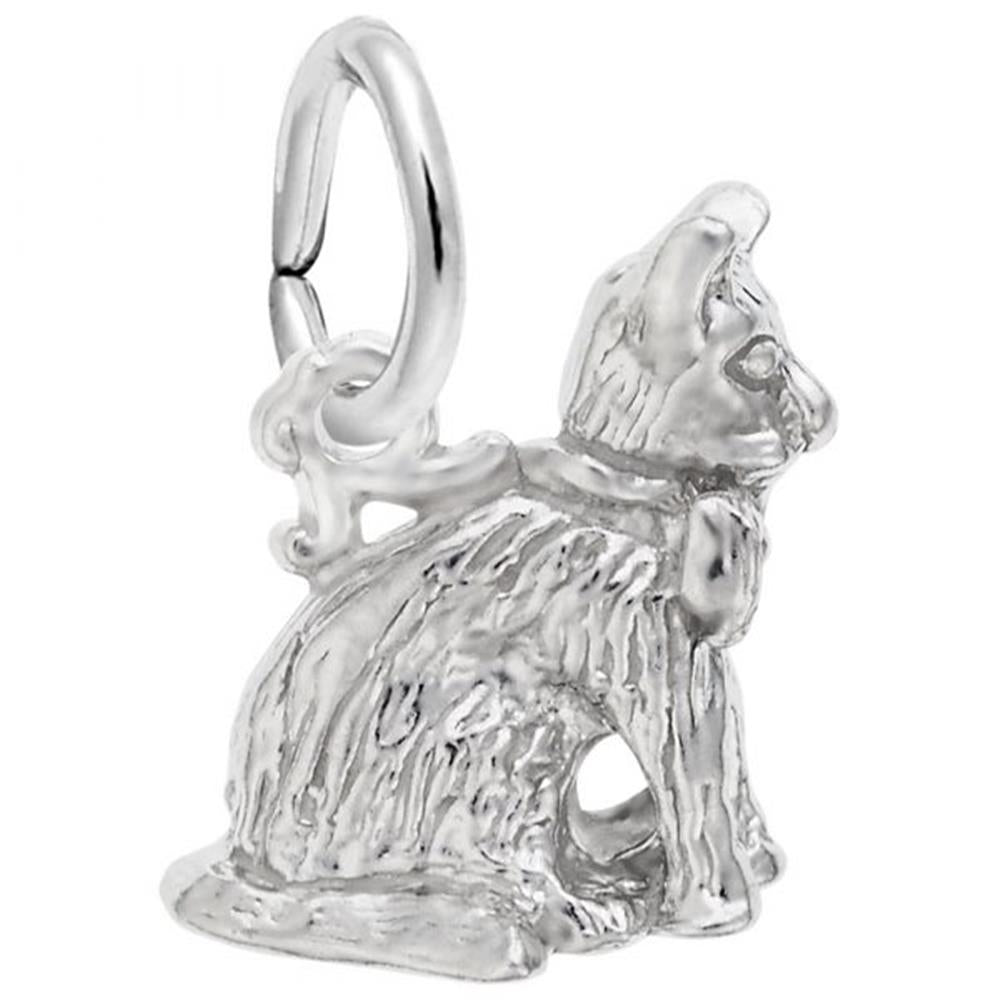 The Sitting Cat Charm in sterling silver from Rembrandt Charms showcases a detailed sitting feline with textured fur. The cat is adorned with a small collar and features an attached ring, allowing it to be used as a pendant or an addition to a charm bracelet. This piece boasts a vintage and elegant look.