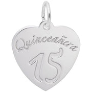 The Rembrandt Charms Quinceanera Charm, crafted from sterling silver, features a heart-shaped design with "Quinceañera" elegantly engraved at the top and the number "15" beneath it. A small loop is attached at the top for wearing as a charming necklace pendant.