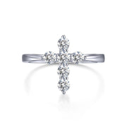 The Lafonn 0.30 CTW Cross Ring forms a timeless symbol, featuring a cross adorned with seven Lafonn diamonds, elegantly positioned atop a thin, polished band. The ring is beautifully presented against a plain white background.
