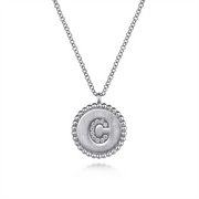The 925 Sterling Silver Diamond Bujukan Initial C Necklace from Gabriel & Co features a silver pendant adorned with a raised, diamond-encrusted letter "C." Crafted from 925 sterling silver, the pendant boasts a beaded edge and is suspended from a delicate chain. This elegant design beautifully showcases the sparkling initial at its center.