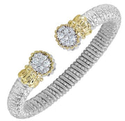 Introducing the Alwand Vahan Jewelry Pave Diamonds Bracelet 8mm Vahan: A stunning silver cuff bracelet featuring a ribbed design and elegant 14k yellow gold accents at both ends. Each end is adorned with a cluster of small, sparkling diamonds, adding an exquisite touch to this remarkable piece.