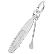 The Rembrandt Charms Paddle Board & Paddle Charm in sterling silver features an elongated surfboard with subtle texture details and an intricately designed paddle handle. Both elements are attached to a circular loop for easy attachment to accessories.