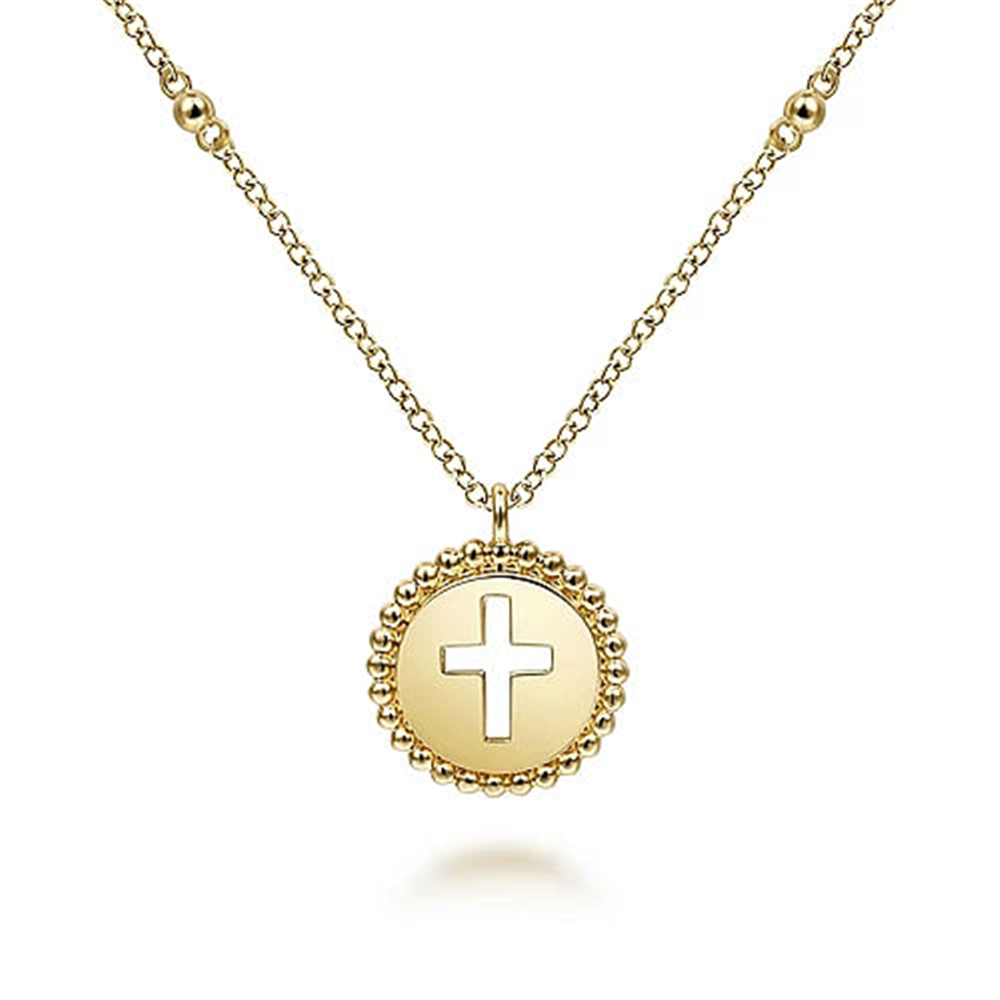 The 14K Yellow Gold Bujukan Cross Pendant Necklace by Gabriel & Co showcases a chain adorned with small, evenly spaced beads. Its round pendant features a cross cut-out design and is surrounded by a beaded edge.