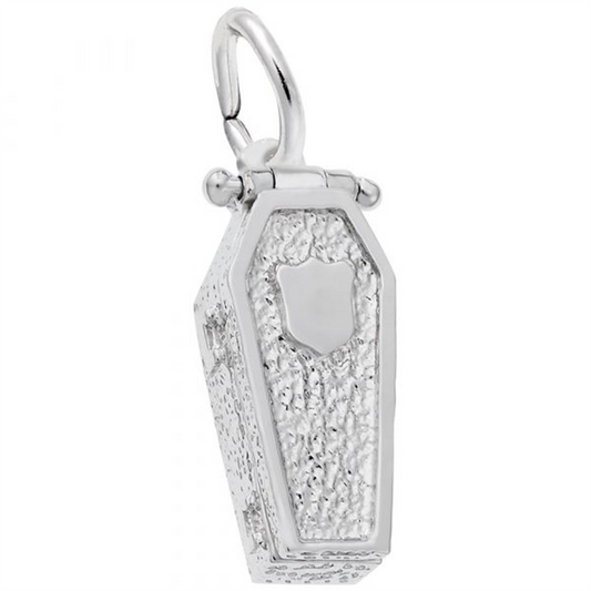 The Coffin Charm in Sterling Silver by Rembrandt Charms boasts a textured design and a small shield emblem on the front. It includes a loop for easy attachment to a chain or bracelet.