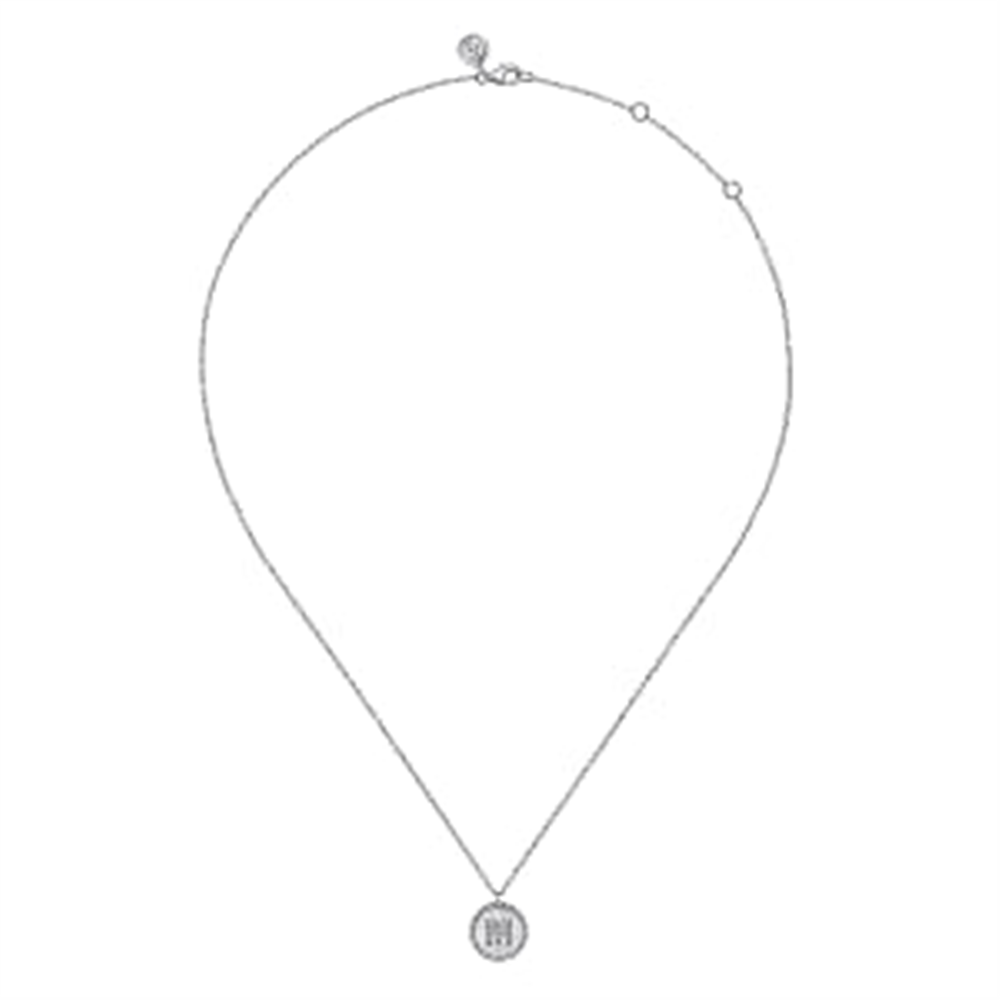 Gabriel & Co's 925 Sterling Silver Diamond Bujukan Initial M Necklace features a fine chain and a round pendant with intricate detailing, possibly with a pattern or engraving at its center. This elegant necklace also includes a small clasp and several tiny beads along the chain, adding to its unique charm.