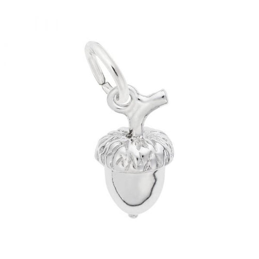 The Rembrandt Charms Acorn Charm in Sterling Silver features a polished finish, a detailed cap, and a small loop at the top for easy attachment to bracelets or necklaces. This nature-inspired piece of jewelry is showcased against a plain white background.