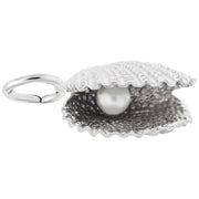 The Rembrandt Charms Shell With Pearl Charm in sterling silver is intricately designed as a detailed, textured clam shell that is partially open to reveal a lustrous white pearl inside. The clam shell features a ridged surface and includes a small circular loop for attaching to a bracelet or necklace.