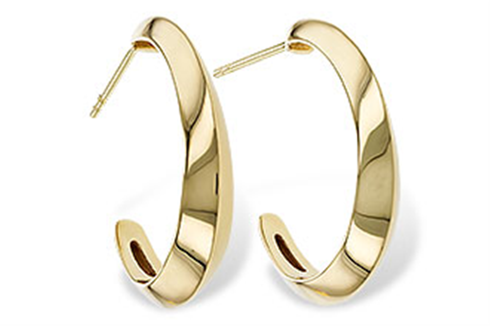 A dazzling pair of large half hoop 14k gold earrings by Allison Kaufman, featuring a slightly twisted, open-ended design with a smooth, reflective surface. These elegant earrings come with a post and back closure, set against a white background.