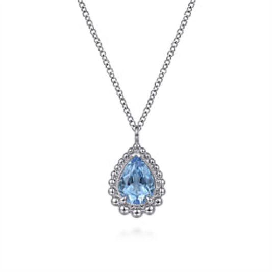 The Gabriel & Co 925 Sterling Silver Faceted Swiss Blue Topaz Pear Shape Bujukan Neck is a delicate necklace featuring a teardrop-shaped Swiss Blue Topaz pendant. The gemstone is surrounded by a detailed silver border of 925 Sterling Silver, hanging from a fine, interlinked chain. As part of the Bujukan Collection, the overall design is elegant and refined.
