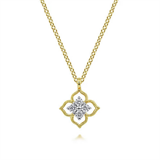 The Gabriel & Co 14K Yellow Gold Floral Diamond Pendant Necklace features a chain adorned with a pendant that boasts an intricate lace-like design. At its center, a cluster of sparkling diamonds forms the shape of a flower. This exquisite piece from our Floral Collection is shown against a pristine white background.