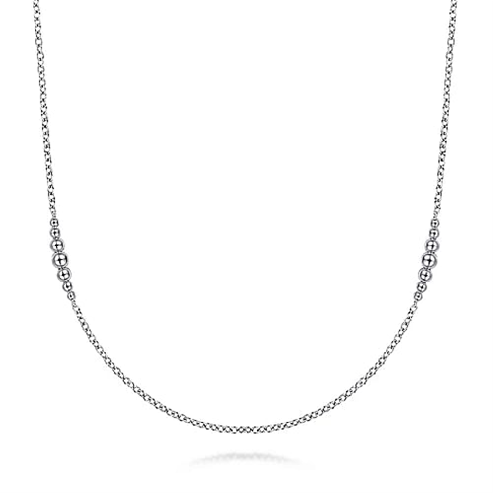 The Gabriel & Co 925 Sterling Silver Station Necklace (Serial No: S1746123, Size: 32) is a minimalist masterpiece from the Bujukan Collection. It features a thin, delicate chain adorned with small clusters of evenly spaced beads symmetrically positioned away from the center, creating a balanced and elegant design. Expertly crafted jewelry presented against a white background.