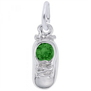 The Rembrandt Charms Sterling Silver baby shoe charm features a round, bright green gemstone at its center and a top loop for easy attachment to a necklace or bracelet.