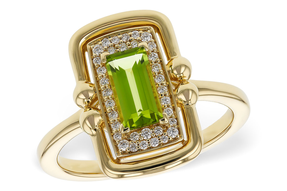 The Allison Kaufman LDS RG .72 Peridot Ring features an 8x4mm rectangular green gemstone and sparkling accents in an ornate gold split shank design—ideal for gemstone jewelry enthusiasts.