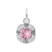 The Rembrandt Charms Petite Birthstone - October Charm in sterling silver showcases a petite birthstone at its center, encircled by elegant accents and complemented by a small loop at the top for seamlessly attaching to bracelets or necklaces. This design exudes sophistication, making it perfect for any jewelry collection.