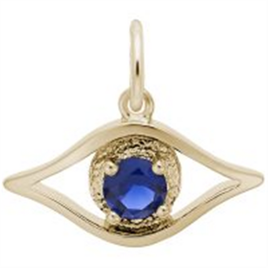 The Rembrandt Charms Evil Eye - Gold Plated Charm features a gold eye-shaped pendant with a textured border, encircling a deep blue gemstone. This elegant charm includes a small loop for easy attachment to your favorite chain.