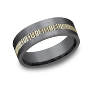 Introducing the Linear Hatching Two Tone Band from Benchmark Rings / Amarra Stone: a sophisticated black titanium ring featuring a striking middle band with a textured 14K yellow gold pattern. With its matte finish and modern, elegant design, this ring is the epitome of sleek style.