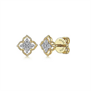 The 14K Yellow Gold Floral Diamond Stud Earrings, part of Gabriel & Co's Floral Collection, feature intricate floral designs with small diamonds at the center of each petal. These exquisite earrings have a back closure engraved with the brand name "Gabriel & Co.
